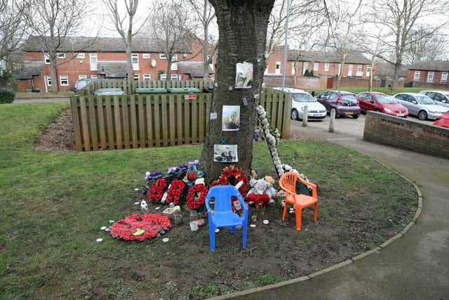 Floral Tributes in Nest Farm Crescent placed as a memorial to Shane Fox, 26,