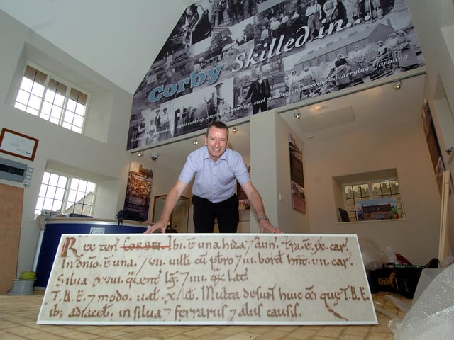 Billy Dalziel in the soon-to-be-opening heritage centre, with an extract from the Doomsday Book which mentions Corbei, May 2011