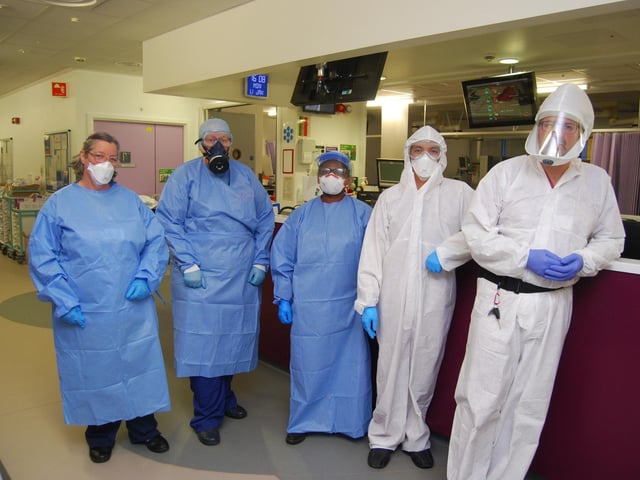 Some of ICU team in full PPE Fiona Prior, Jo Snow, Menesia Chikazi, Josef Enojo and Andy Chatwin.