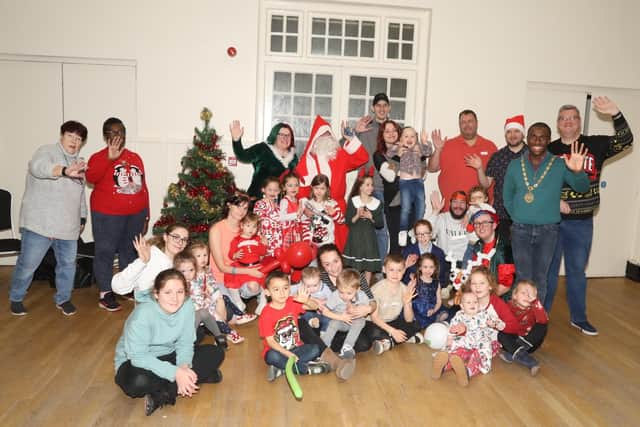 Christmas party guests and helpers in the Cornmarket Hall, Kettering at an event organised by Kettering Town Council in conjunction with Mother Christmas Jeanette Walsh/National World
