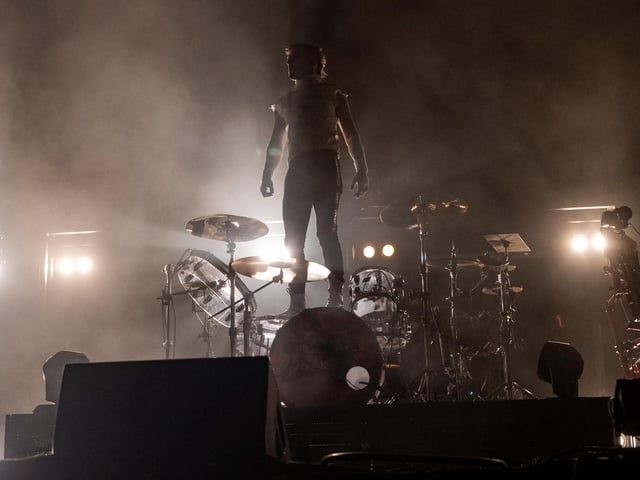 The Prodigy live drummer standing on his kit between songs at The National Bowl in Milton Keynes, on Saturday, August 22, 2026. Photo by David Jackson.