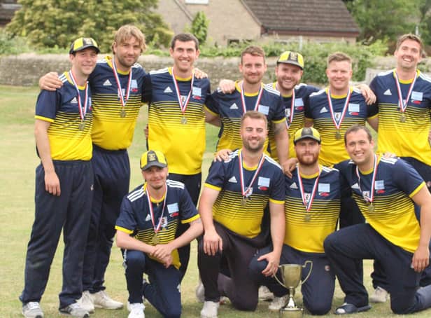 Finedon Dolben show off the NCL T20 Championship trophy after they defeated Oundle Town and Desborough Town on Finals Day. Picture by Finbarr Carroll