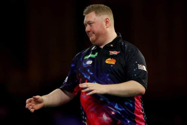 Kettering's Ricky Evans ws beaten by Daryl Gurney in the third round of the 2023/24 Paddy Power World Darts Championship at Alexandra Palace (Picture: Tom Dulat/Getty Images)