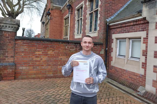 Ben Morley outside Wellingborough Magistrates' Court with his letter from ACRO, proof that he had paid the £100 FPN