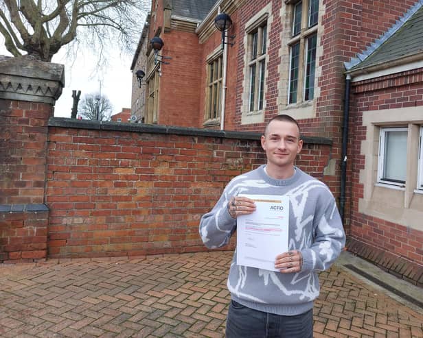 Ben Morley outside Wellingborough Magistrates' Court with his letter from ACRO, proof that he had paid the £100 FPN