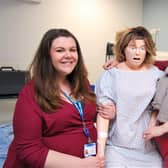 L-R Human Resources and Digital Learning Officer Alice Power and Head of People Development Sheila Turner with one of the state-of-the-art computerised simulation manikins used in staff training.