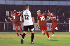 Sam Bennett heads off to celebrate after he opened the scoring with his first goal for the club in Kettering Town's 2-0 victory over AFC Telford United. Picture by Peter Short