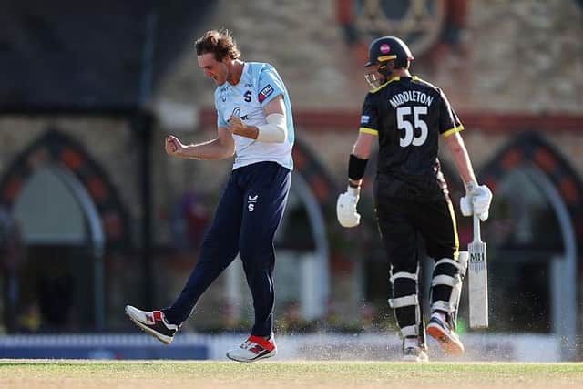 Steelbacks bowler Dom Leech celebrates taking the wicket of Ed Middleton