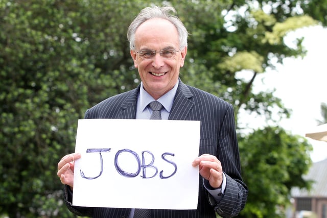 Peter Bone MP for Wellingborough and Rushden holding the 'Jobs' sign in support of Rushden Lakes.  June 2013