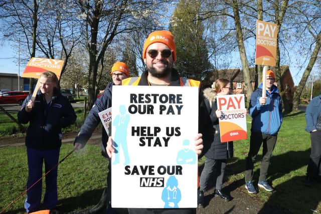 Dr Thom Jeffery outside Kettering General Hospital at the start of the four-day strike by BMA members