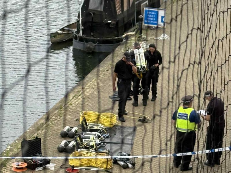 Divers were spotted searching the river on Sunday afternoon August 3.
