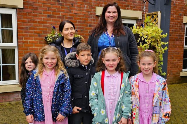 Teachers and Children from St Thomas More School
