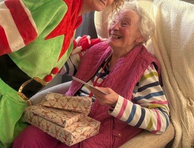 Resident Annette with Brampton View's own Elf Elaine
