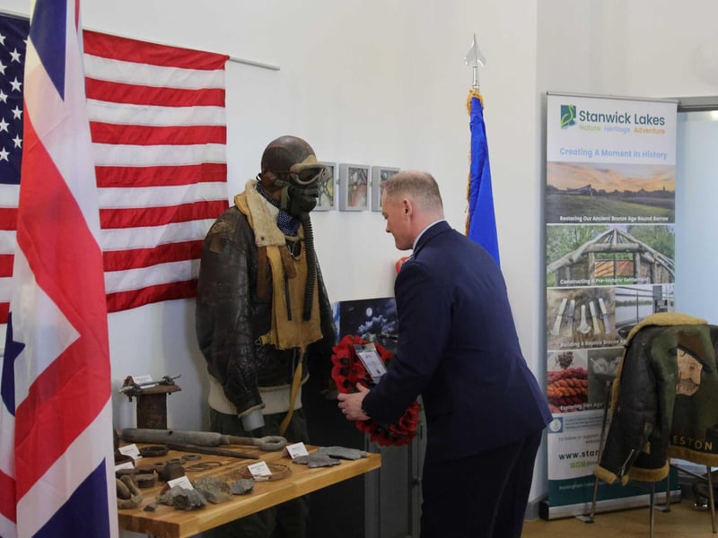 A wreath being laid at the special ceremony held at Stanwick Lakes