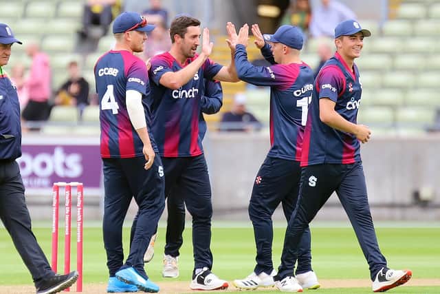 Ben Sanderson is congratulated after taking the wicket of Alex Davies (Picture: Peter Short)