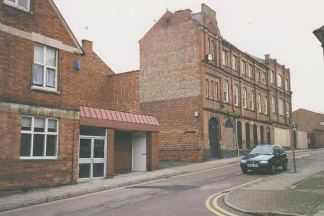 1999 - Dryland Street Kettering the former workhouse and Evening Telegraph offices soon to be demolished to make make for Printers Yard Every Picture Tells a Story by Dave Clemo