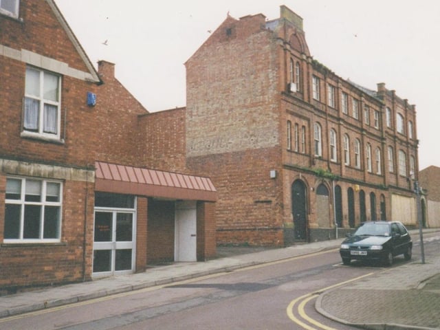 1999 - Dryland Street Kettering the former workhouse and Evening Telegraph offices soon to be demolished to make make for Printers Yard Every Picture Tells a Story by Dave Clemo