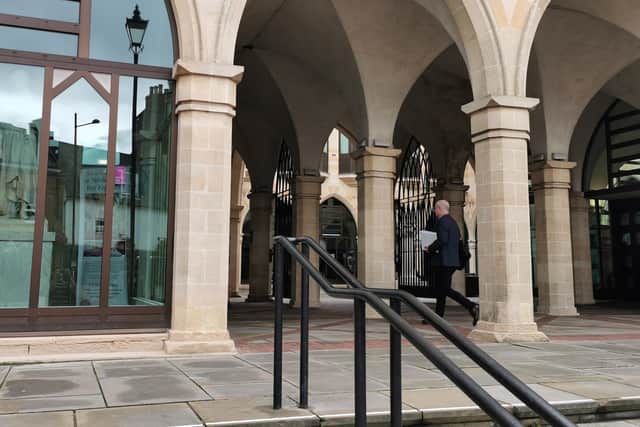 Stephen Mold waited for the 'angry' protesters to leave before entering The Guildhall today (Thursday)