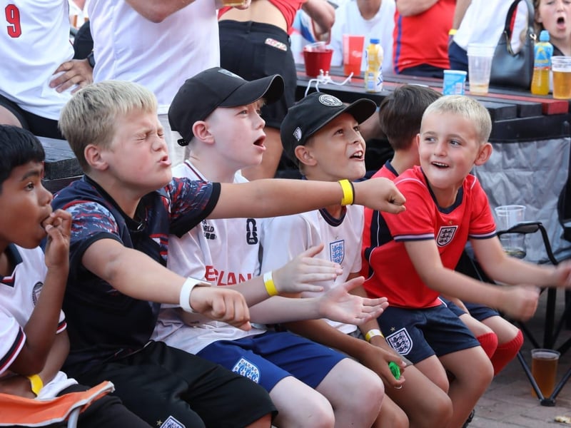 Fans at the Kettering Town FC World Cup Fan Zone watch England vs Argentina in the semi-final