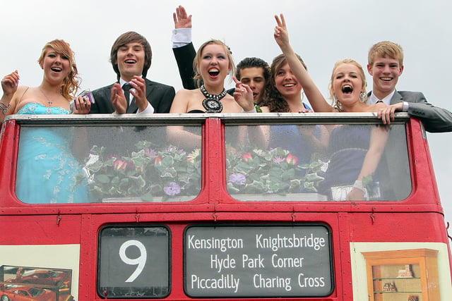 Year 11 students arrive in an open top London Bus to Higham Ferrers Specialist Art College prom 2011