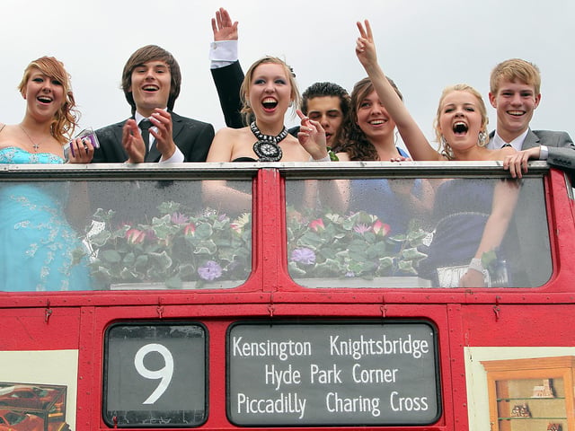 Year 11 students arrive in an open top London Bus to Higham Ferrers Specialist Art College prom 2011