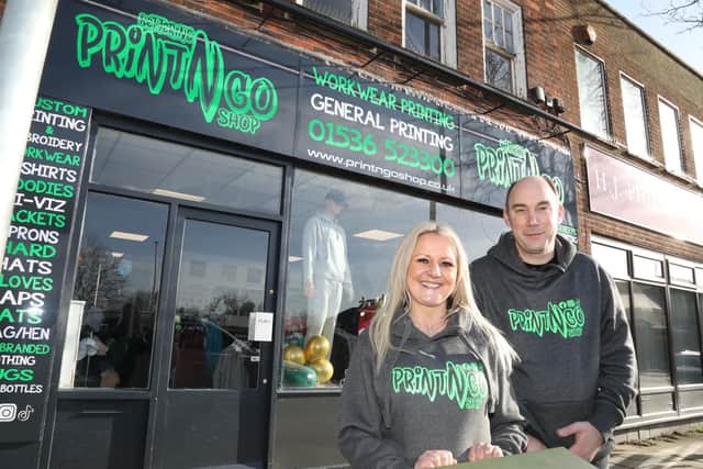 Jo Gamble and Nick Gamble outside Print N Go Shop in Rockingham Road, Kettering/National World