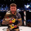 Jordan Vucenic shows his delight after he defended his Cage Warriors featherweight title. Pictures by Dolly Clew (www.dollyclew.com)