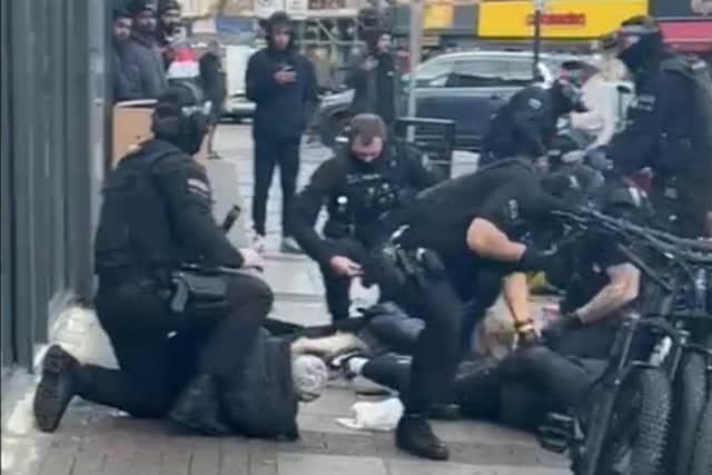 Armed police arrest three men outside a chicken shop in Kettering town centre/UGC