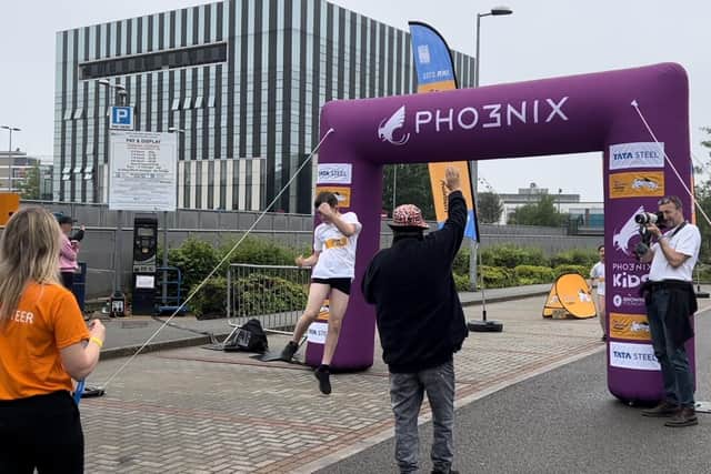 Corby radio’s Des Barber was also on the finish line to cheer the children on at the final stretch