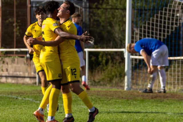 Jordan O'Brien celebrates one of his two goals at Desborough Town on Saturday (Picture: Shaun Frankham)