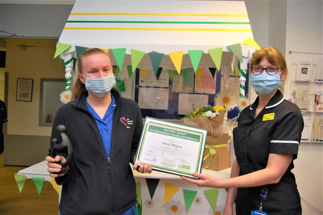 Daisy Award Community Midwife Alice Stillgoe receives her award from director of nursing Fiona Barnes