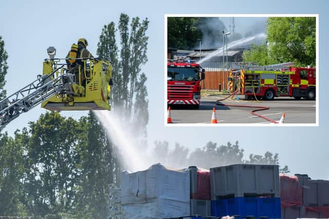 Firefighters at the scene of the fire in Brunel Close, Kettering