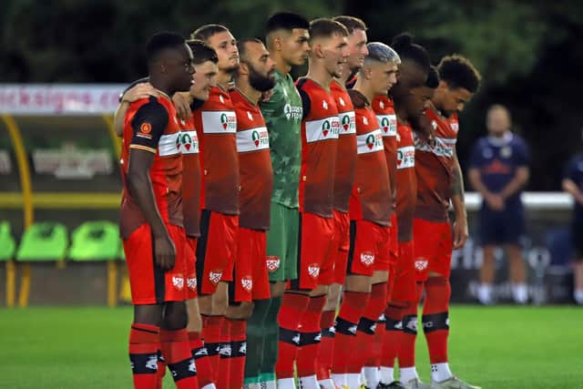 The Poppies players paid their respects to Her Majesty Queen Elizabeth II ahead of the game at Leamington