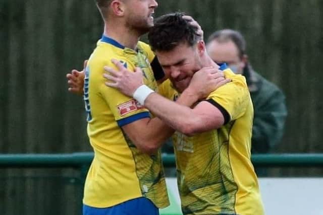 Wellingborough Town's Connor Tomlinson (right) celebrates putting his side ahead against Belper Town (Picture: Rob Webb)