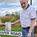 Gary Salmon left  and Geoff Moore at the new road that pays tribute to  William Ernest Draper