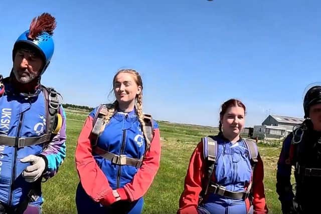 Caitlin (left) and Jasmine skydive for charity