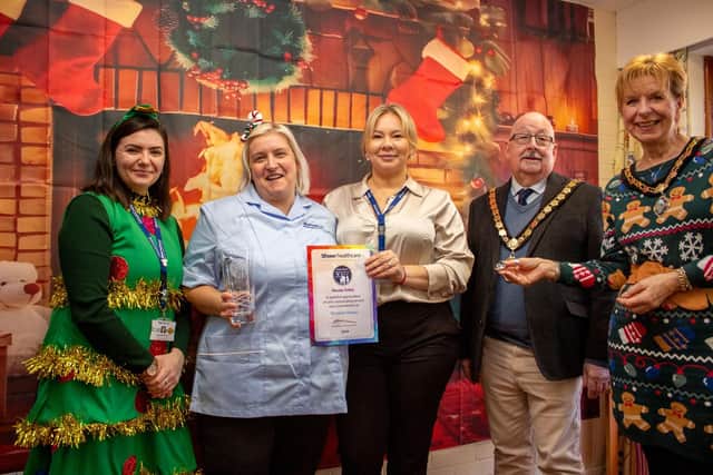 Nicola Tobin receiving her 30 years service award