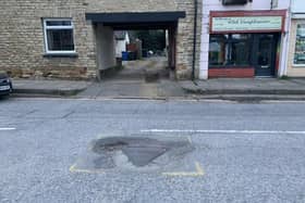 One of the potholes in High Street, Burton Latimer
