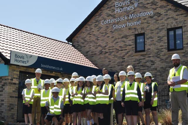 Year 6 pupils at Oundle CE Primary School enjoying a site visit to Bovis Homes’ Cotterstock Meadow.