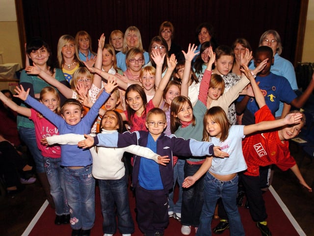 Models and organisers taking part in a fashion show, October 2008