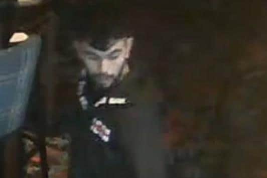 Police officers have released a CCTV image of a man they wish to speak to after a girl was harassed in Corby