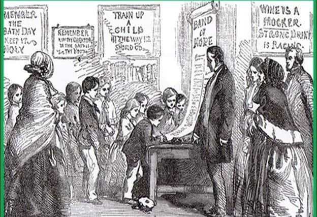 Children signing the pledge to abstain from alcohol in the early days of the Band of Hope