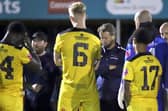Nick Green (left) and David Bridgwater chat to the Kettering team after Tuesday's draw (Picture: Peter Short)