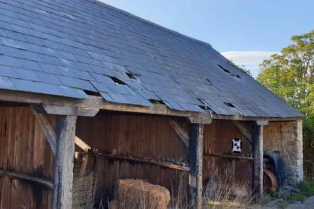 Photograph showing the disrepair and degradation of one of the agricultural barns.Credit: Mr D Bierton