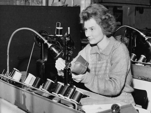 20th February 1964:  Uppers being stitched at a shoe factory in Northampton.  (Photo by George Freston/Fox Photos/Getty Images)