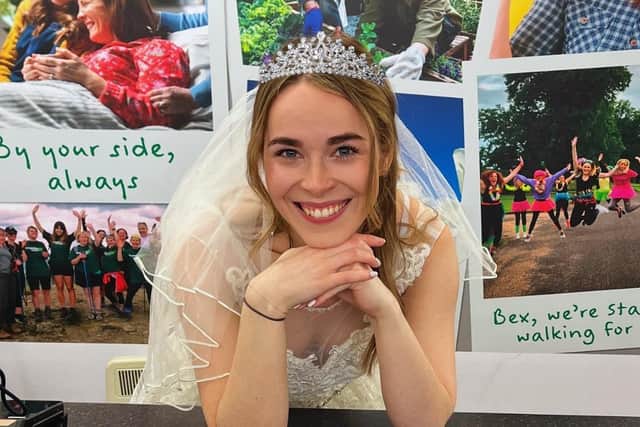 Bride-to-be Beckie Cave in one of the bridal gowns on sale at Cransley Hospice charity shop