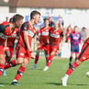 Sam Bennett runs away to celebrate after netting Kettering Town's goal against Alfreton on Saturday (Picture: Peter Short)