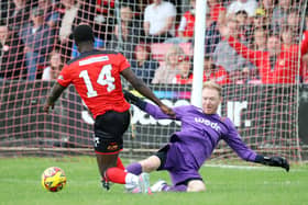Michael Gyasi is brought down for a penalty (Picture: Peter Short)