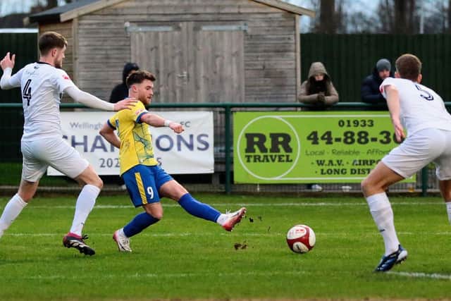 Connor Tomlinson tees up Danny Draper for Wellingborough Town's winning goal against Carlton Town on Saturday (Picture: Rob Webb)