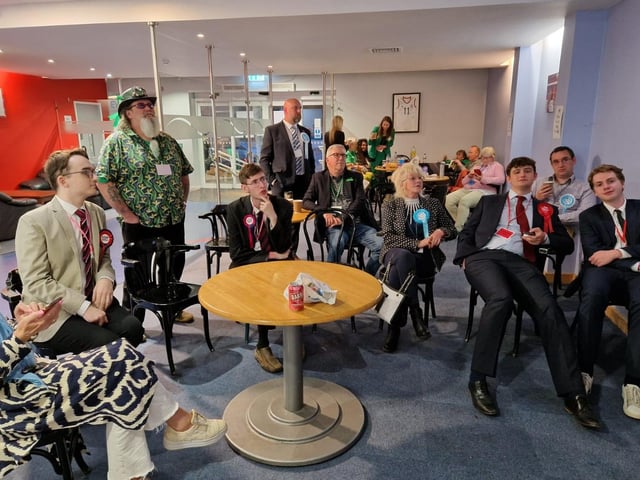 Attendees at the count catch up on news around the UK